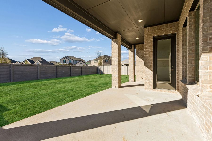 Exterior details and patio area of a home in Painted Tree Lakeside, McKinney (Image 20).