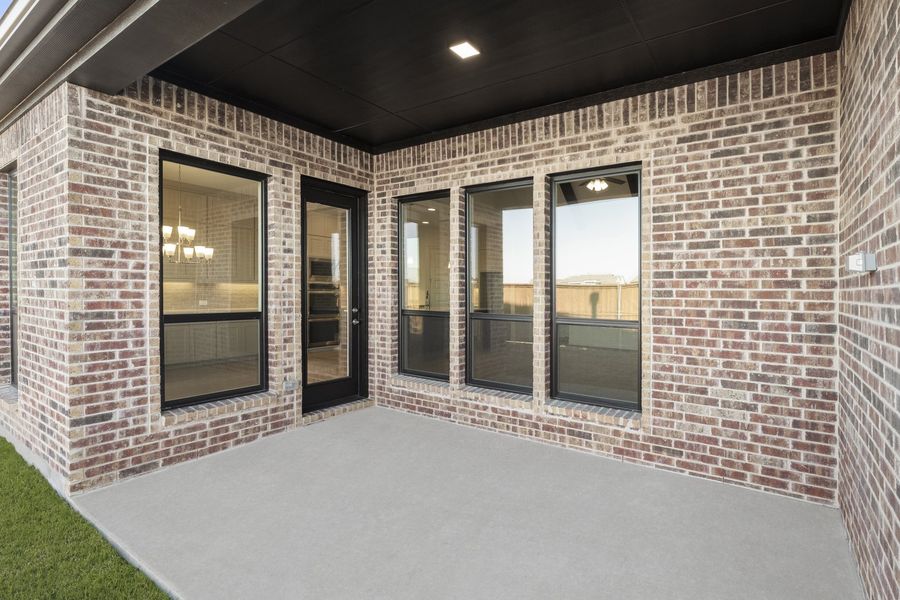 Exterior details and patio area of a home in Nelson Lake Estates, Rockwall (Image 3). Exterior details and patio area of a home in Nelson Lake Estates, Rockwall (Image 3).