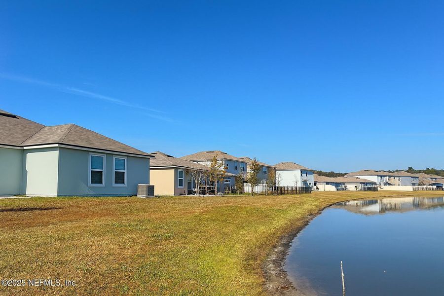 Exterior details and patio area of a home in The Arbors, Jacksonville (Image 3).