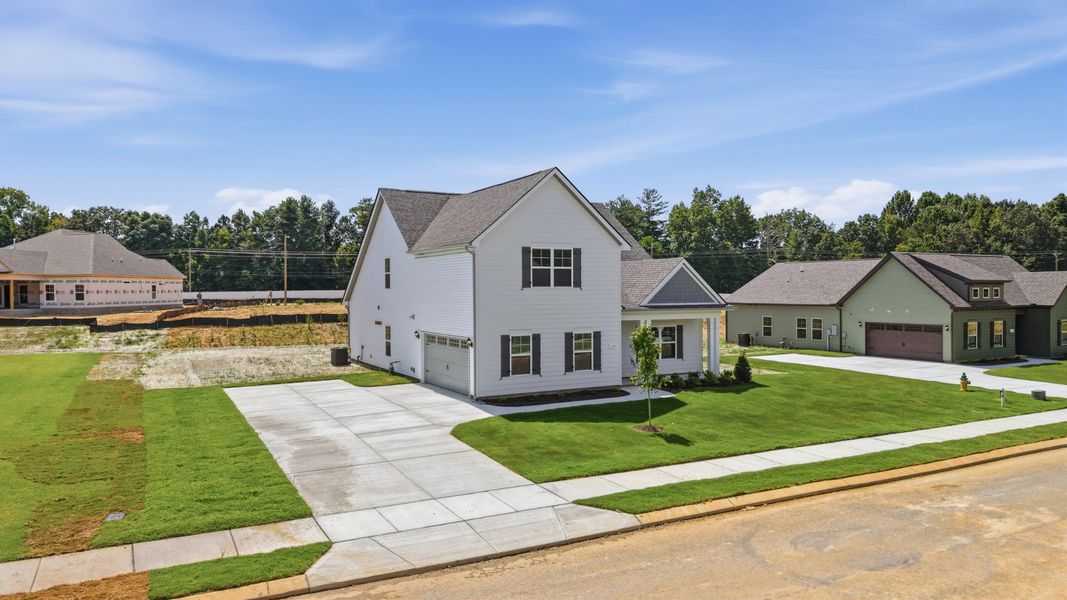 Front exterior of a new home in Stillwater, Tullahoma, TN, highlighting curb appeal (Image 18).