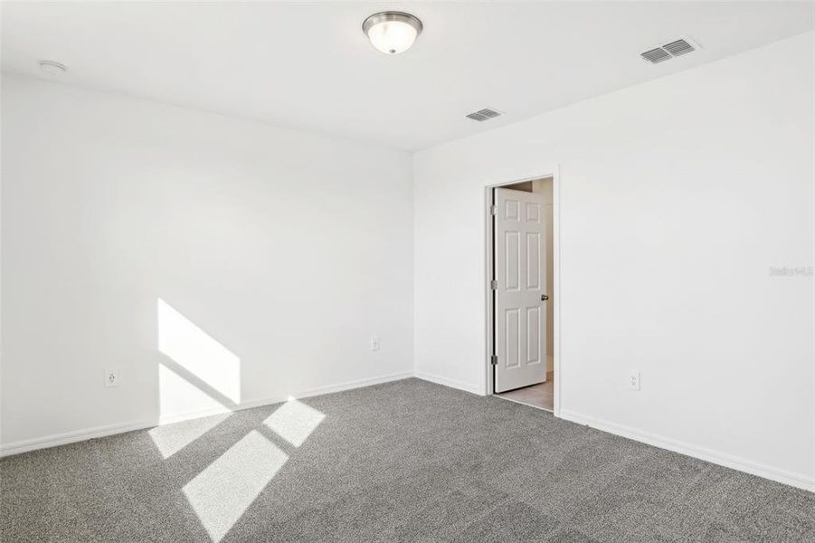 Spacious, unfurnished interior of a new home in Lake Deer Estates - Classic Series, Poinciana (Image 26).