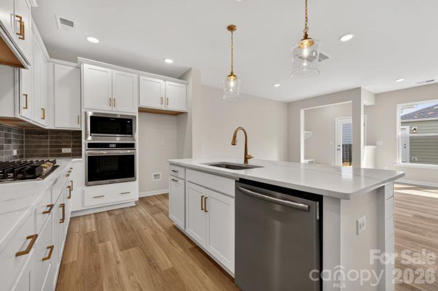 Furnished interior view inside a new home in North Creek Village - Townhomes, Huntersville (Image 6).