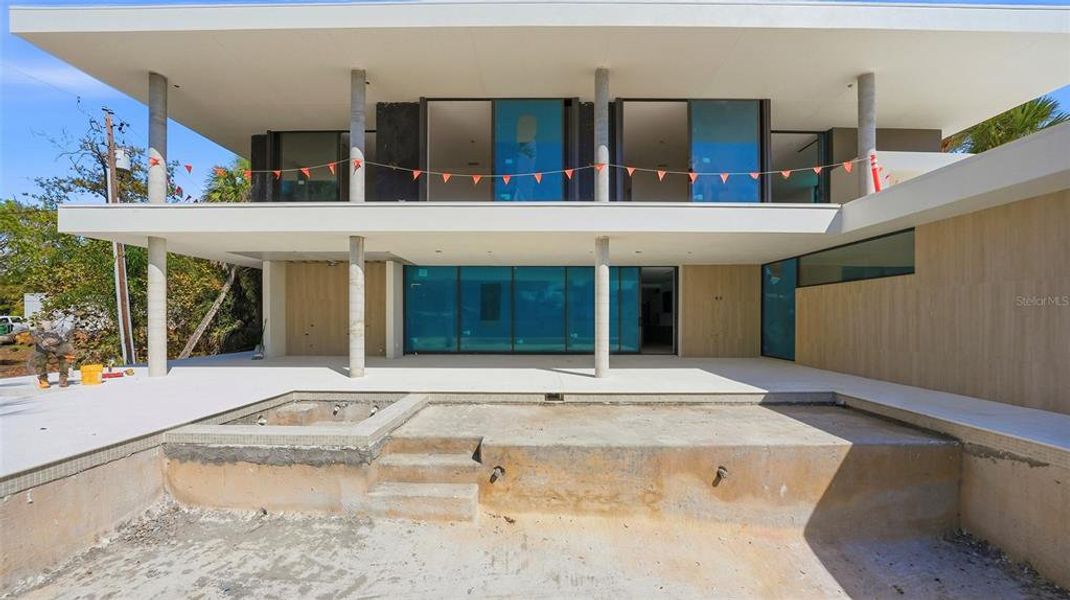 Exterior details and patio area of a home in , Sarasota (Image 9).