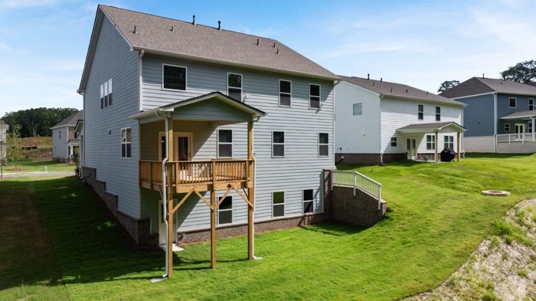 Front exterior of a new home in Butner Estates, South Fulton, GA, highlighting curb appeal (Image 13).