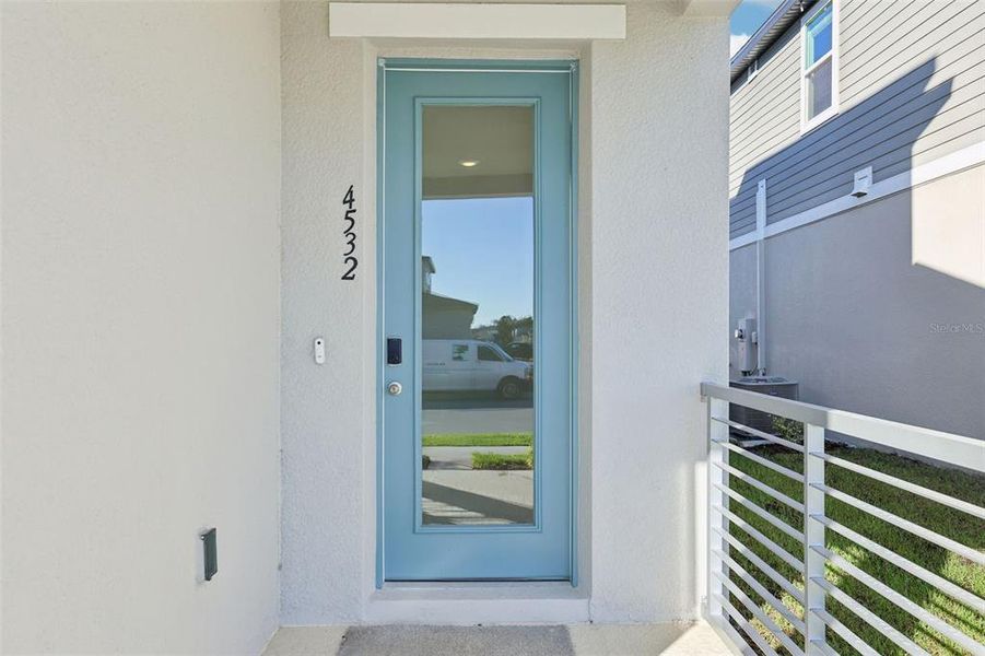 Exterior details and patio area of a home in The Meadow at Crossprairie Bungalows, St. Cloud (Image 36).