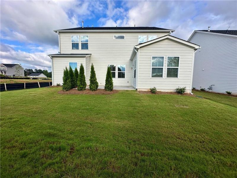 Front exterior of a new home in Berkeley Mill, Cumming, GA, highlighting curb appeal (Image 2).