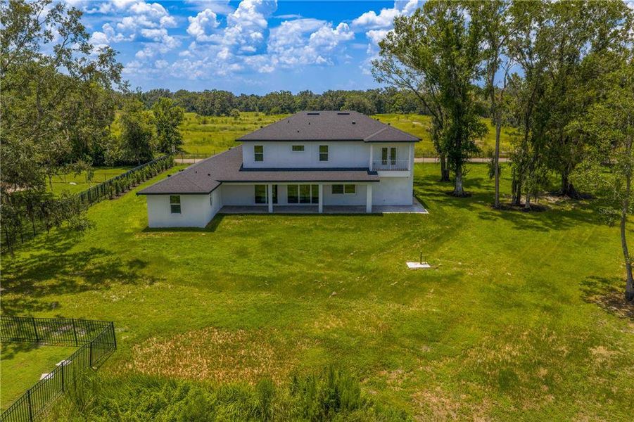 Front exterior of a new home in , Lutz, FL, highlighting curb appeal (Image 23).