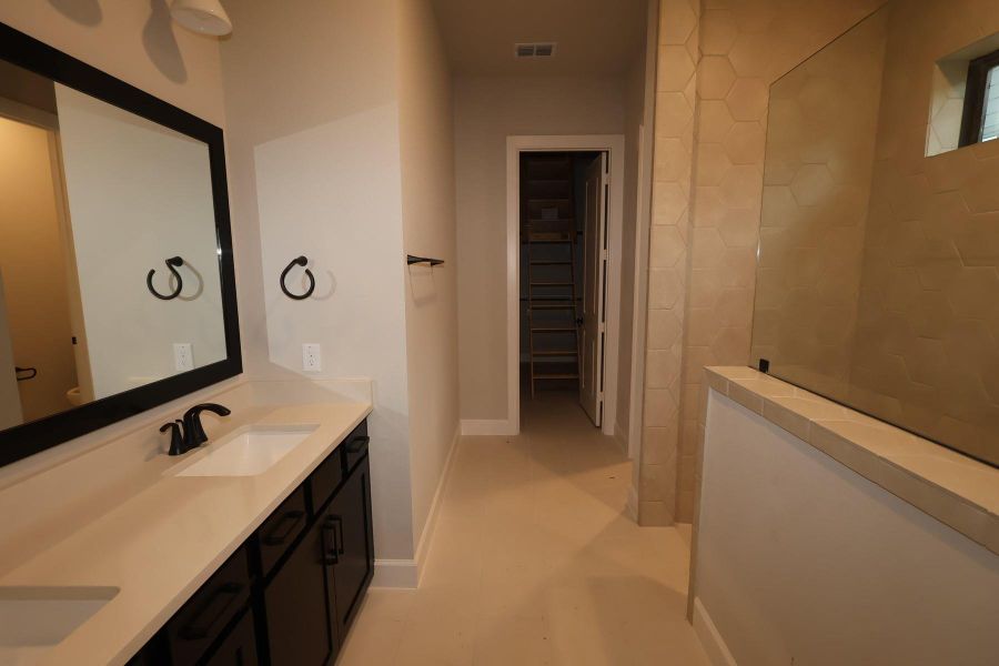 Furnished interior view inside a new home in Sienna - Landmark Row Collection, Missouri City (Image 5).