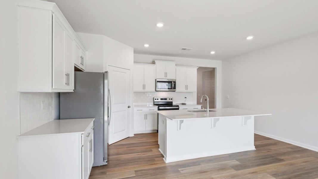 Representative furnished interior of a home built from the Cali by D.R. Horton in Granite Falls, Lancaster (Image 7).