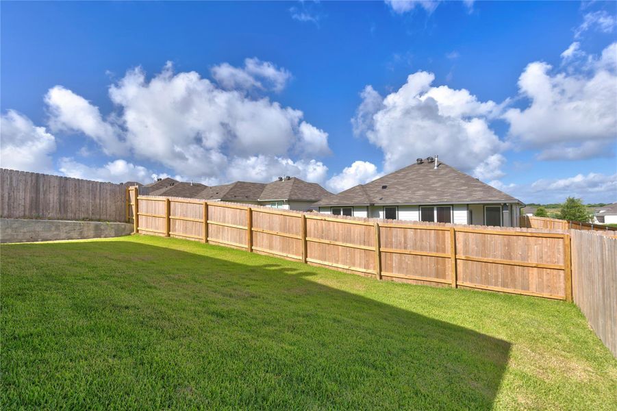 Exterior details and patio area of a home in Vintage Farms, Brenham (Image 30).