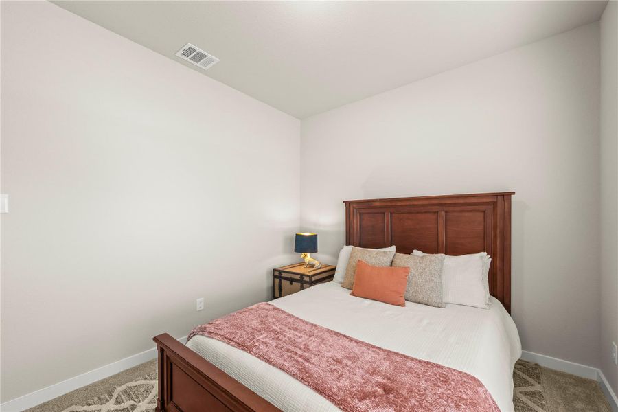 A well-lit bedroom provides a serene retreat for rest and rejuvenation. A well-lit bedroom provides a serene retreat for rest and rejuvenation.