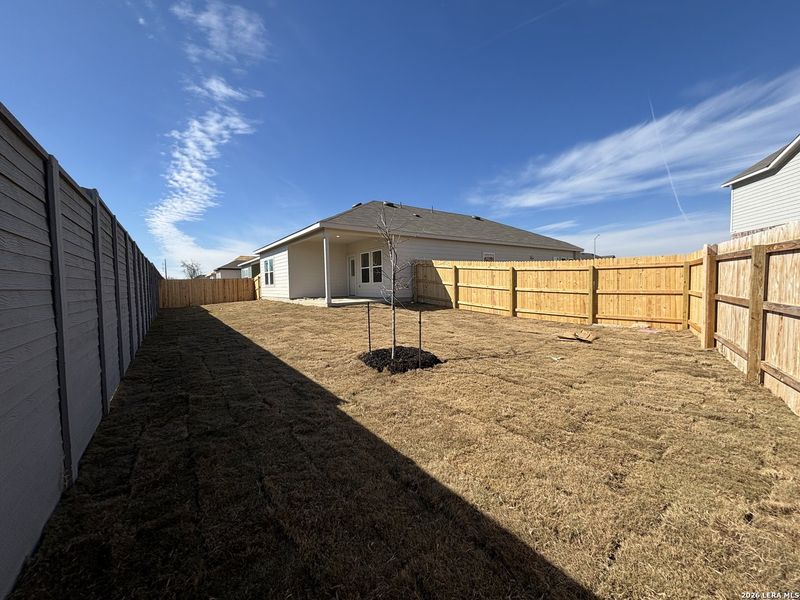 Exterior details and patio area of a home in The Summit at Saddlebrook Ranch 55's, Schertz (Image 28).