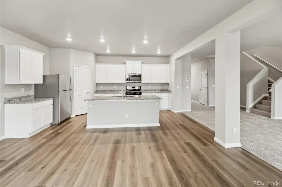 Furnished interior view inside a new home in Cottonwood Greens, Fort Lupton (Image 7).