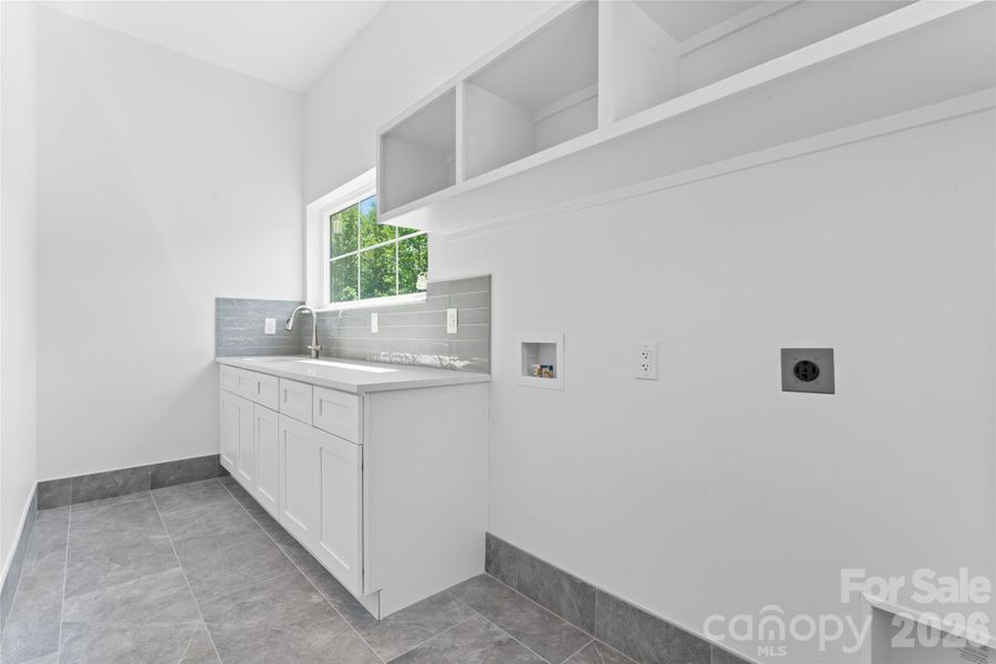 large laundry with sink