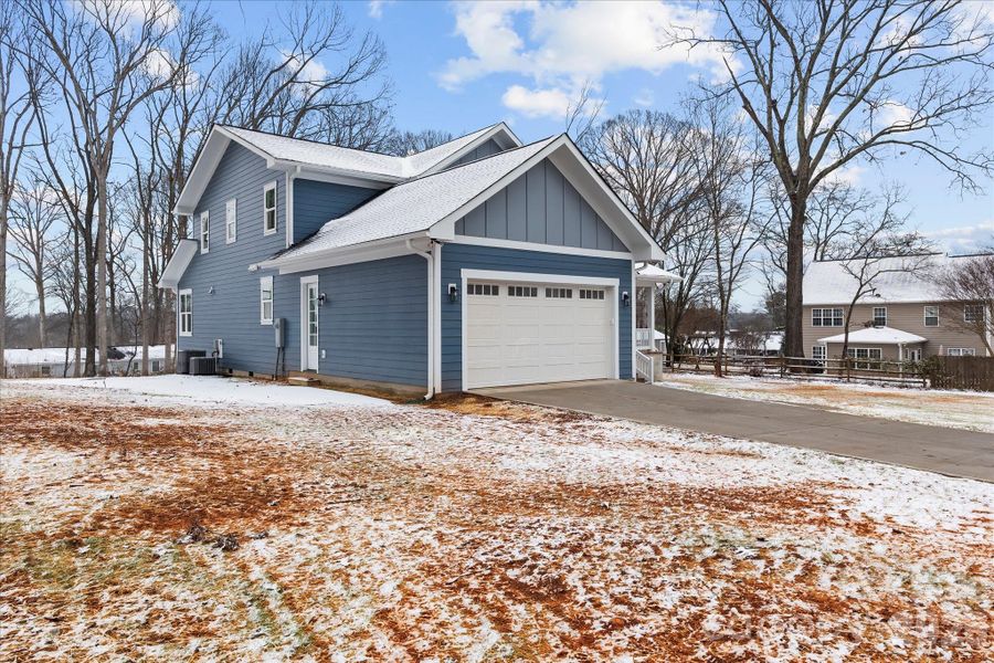Front exterior of a new home in , Mooresville, NC, highlighting curb appeal (Image 23).