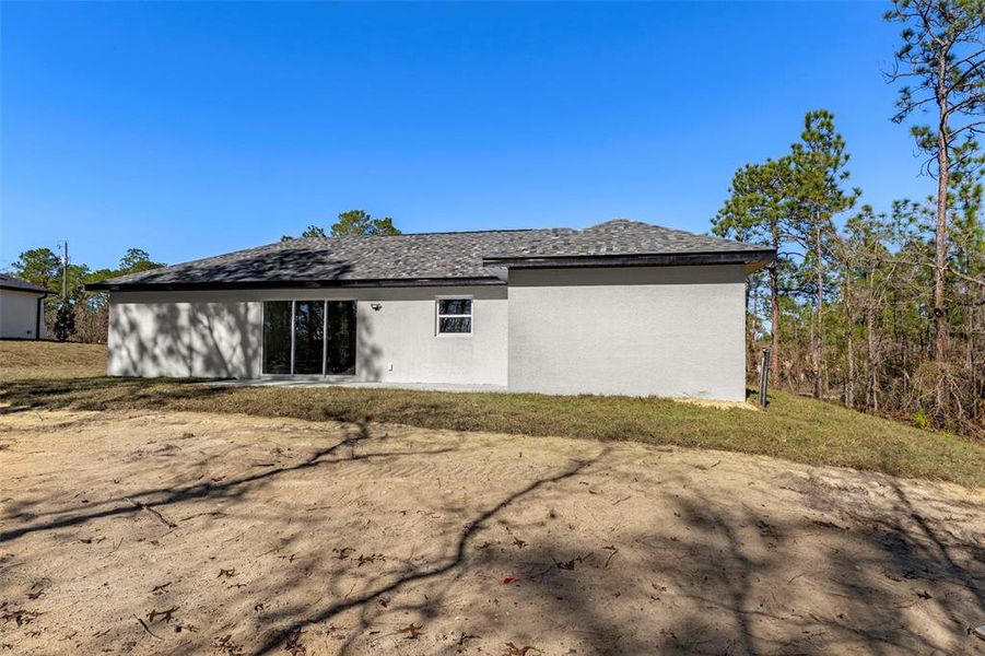 Exterior details and patio area of a home in , Brooksville (Image 3).