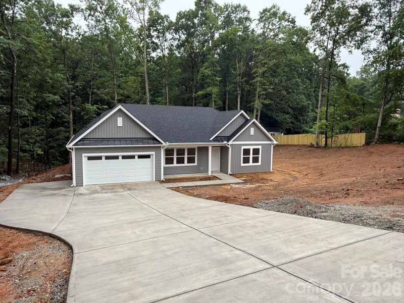 Front exterior of a new home in , Spencer, NC, highlighting curb appeal (Image 1). Front exterior of a new home in , Spencer, NC, highlighting curb appeal (Image 1).