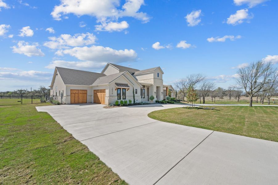 Front exterior of a new home in Fleming Pointe, Fort Worth, TX, highlighting curb appeal (Image 27).