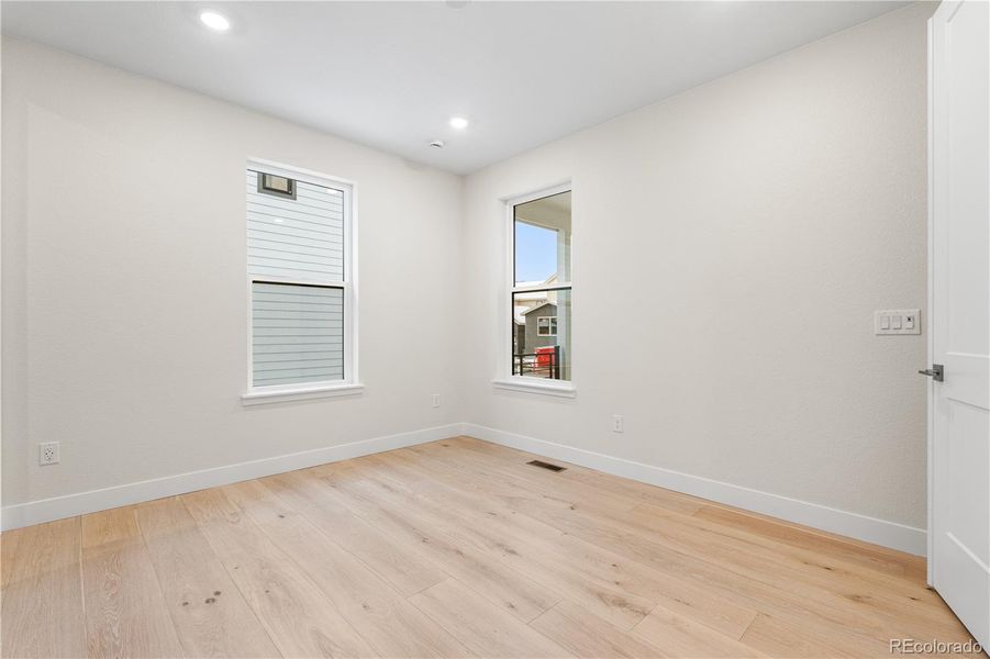 Spacious, unfurnished interior of a new home in Autograph at Lyric, Lone Tree (Image 48).