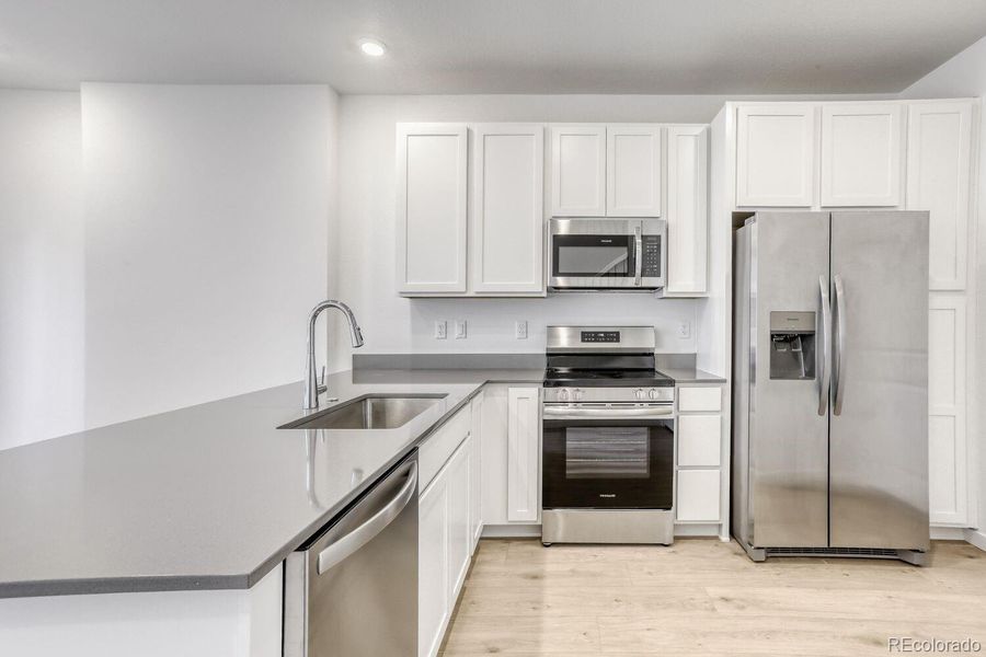 Furnished interior view inside a new home in Parterre, Thornton (Image 5).