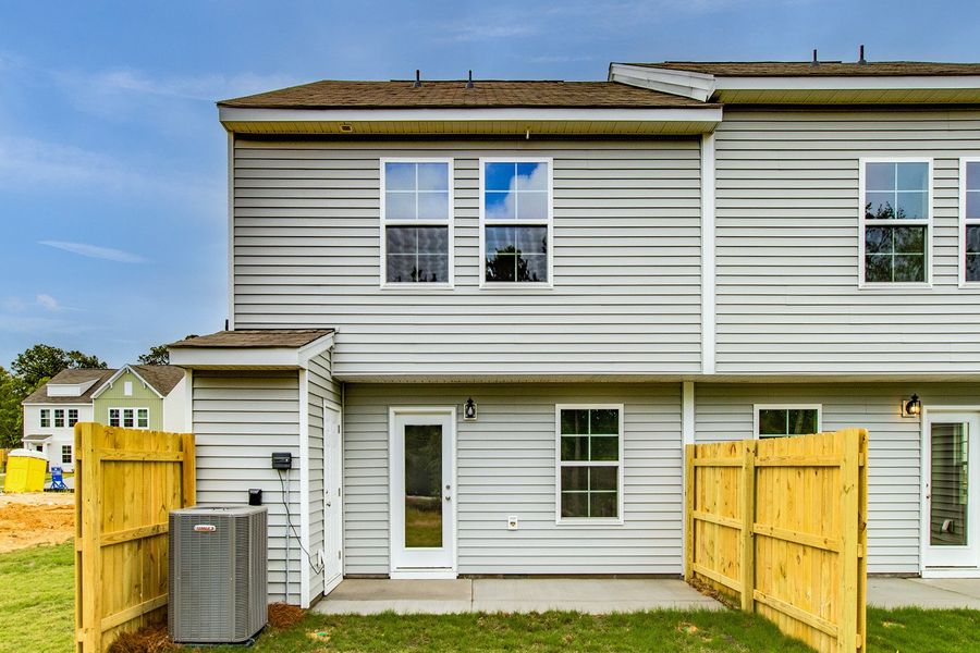 Exterior details and patio area of a home in Padgett Commons, Hopkins (Image 17).