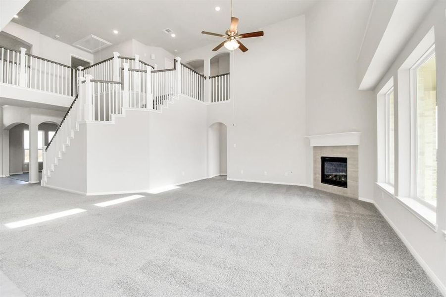 The second floor balcony overlooks the living room and entryway!