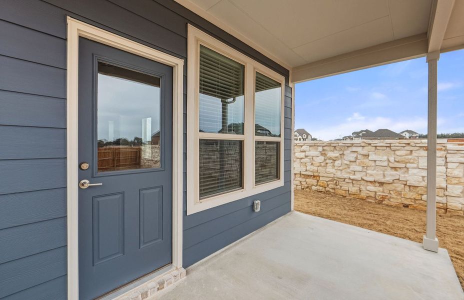 Exterior details and patio area of a home in Saddleback at Santa Rita Ranch, Liberty Hill (Image 3). Exterior details and patio area of a home in Saddleback at Santa Rita Ranch, Liberty Hill (Image 3).