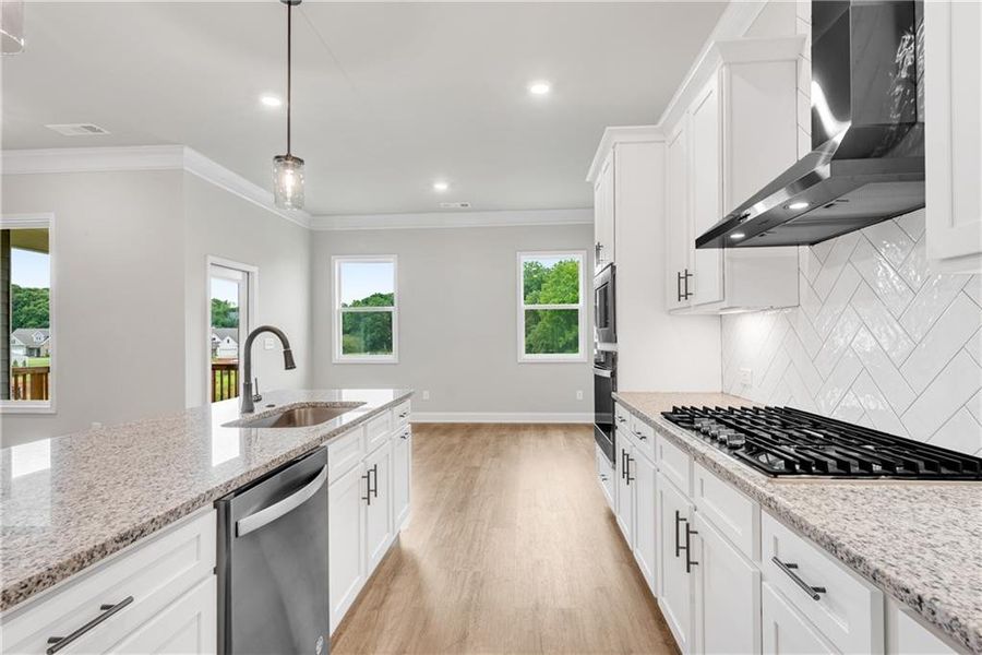 Furnished interior view inside a new home in Hidden Fields, Hoschton (Image 7).