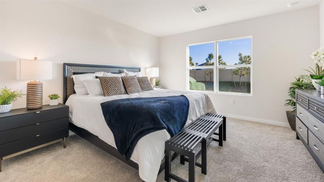 Furnished interior view inside a new home in Cove at West Port - Express, Port Charlotte (Image 9).