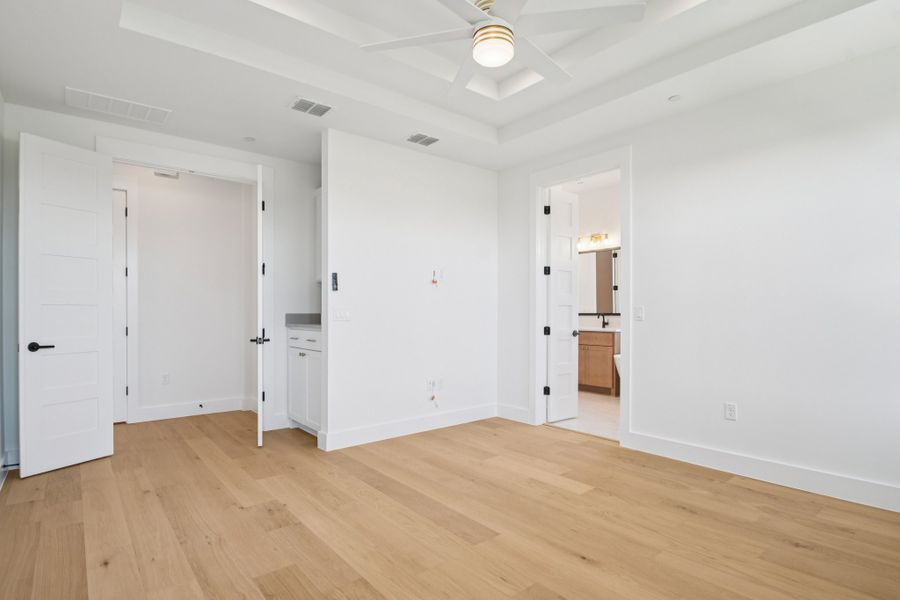 Spacious, unfurnished interior of a new home in Milky Way at River Place, Austin (Image 24).