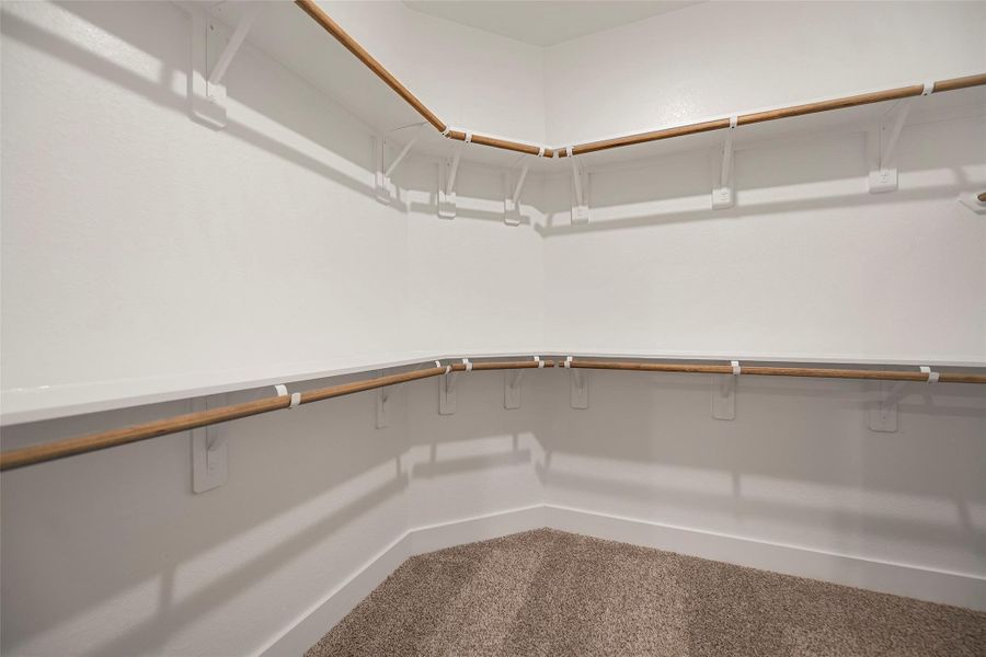 Large walk-in closet just off of the primary bathroom. Large walk-in closet just off of the primary bathroom.