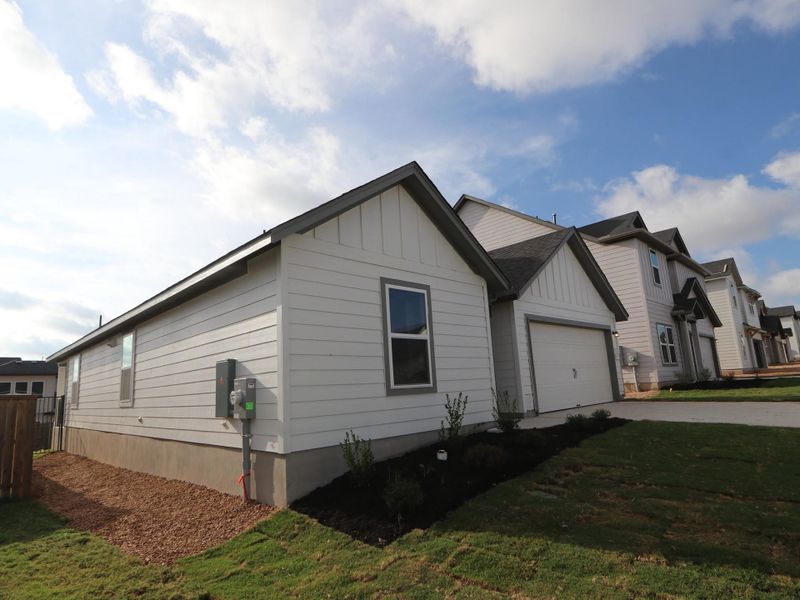 Exterior details and patio area of a home in Cascades at Onion Creek, Austin (Image 2). Exterior details and patio area of a home in Cascades at Onion Creek, Austin (Image 2).
