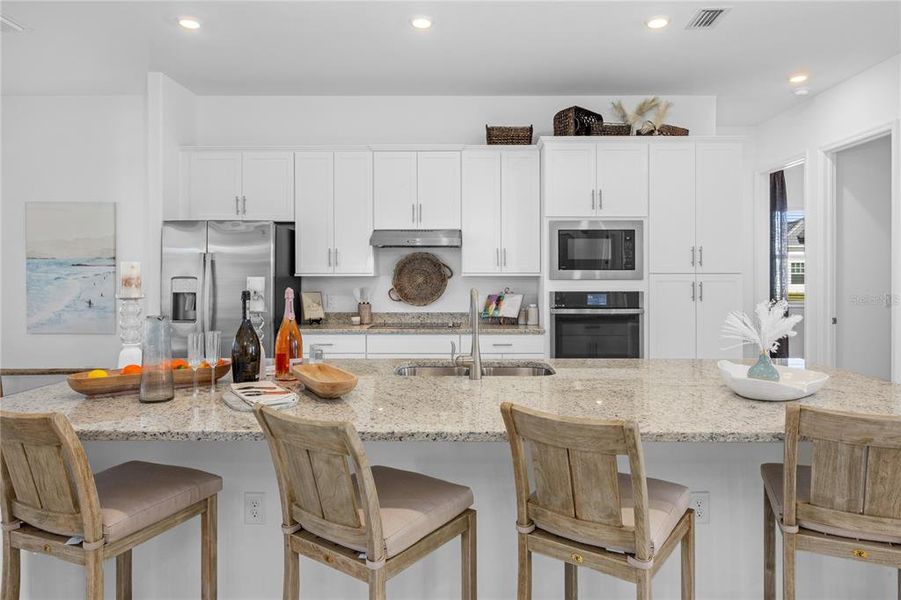 Furnished interior view inside a new home in Calusa Country Club, Lakewood Ranch (Image 17).