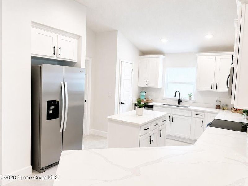 Furnished interior view inside a new home in St. John's Preserve, Palm Bay (Image 5).