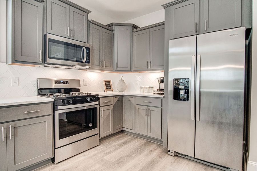 Representative furnished interior of a home built from the Torino by McKee Homes in The Cottages at 78 North, Sanford (Image 3).