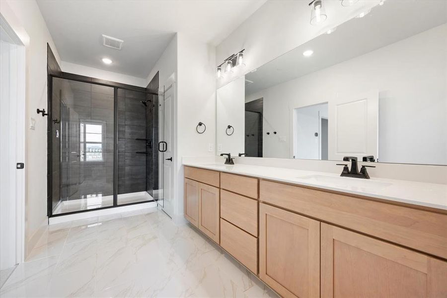 No shortage of space or style in this fantastic owner's bath!