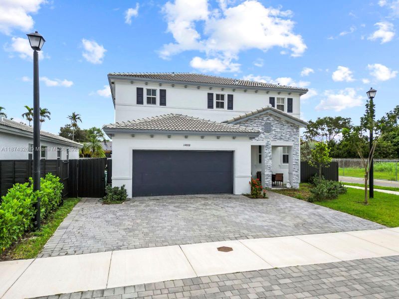 Front exterior of a new home in , Miami, FL, highlighting curb appeal (Image 19). Front exterior of a new home in , Miami, FL, highlighting curb appeal (Image 19).