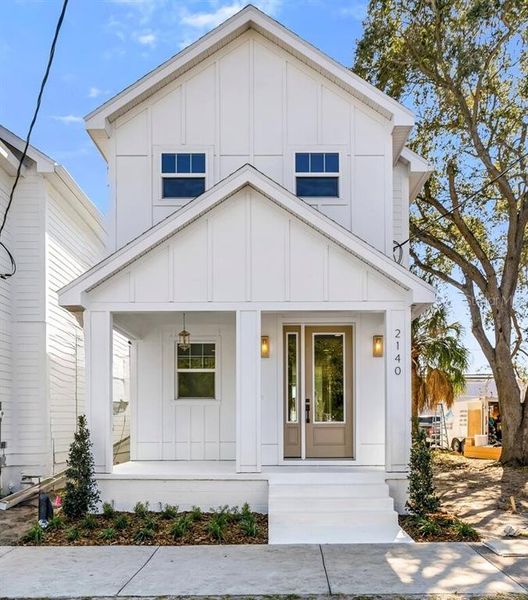 Front exterior of a new home in , Tampa, FL, highlighting curb appeal (Image 1). Front exterior of a new home in , Tampa, FL, highlighting curb appeal (Image 1).