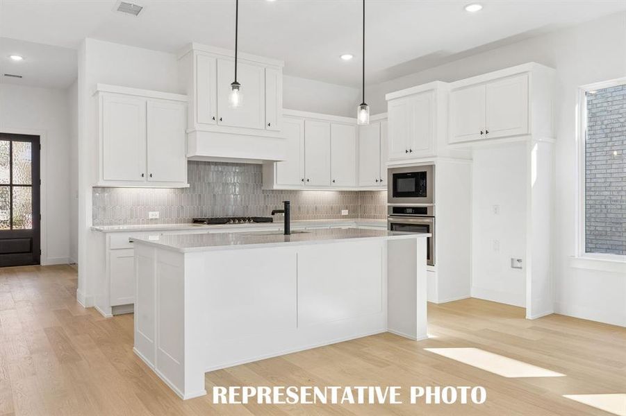 This dream kitchen offers outstanding storage and prep space.  REPRESENTATIVE PHOTO