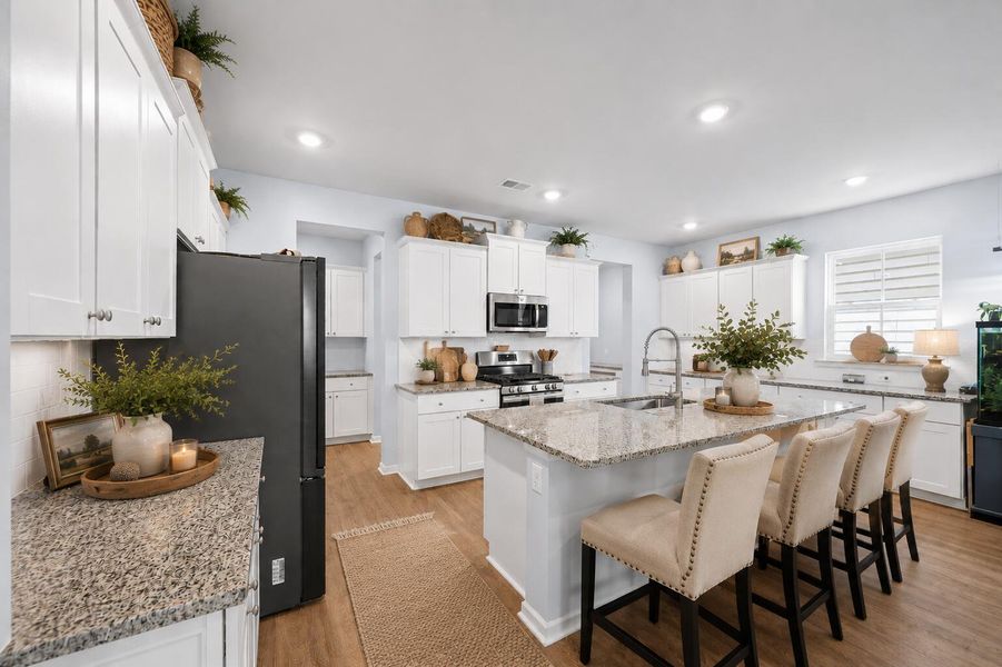 Furnished interior view inside a new home in Sweetgrass at Summers Corner, Summerville (Image 6).