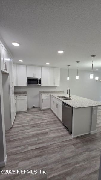 Furnished interior view inside a new home in , Jacksonville (Image 5). Furnished interior view inside a new home in , Jacksonville (Image 5).