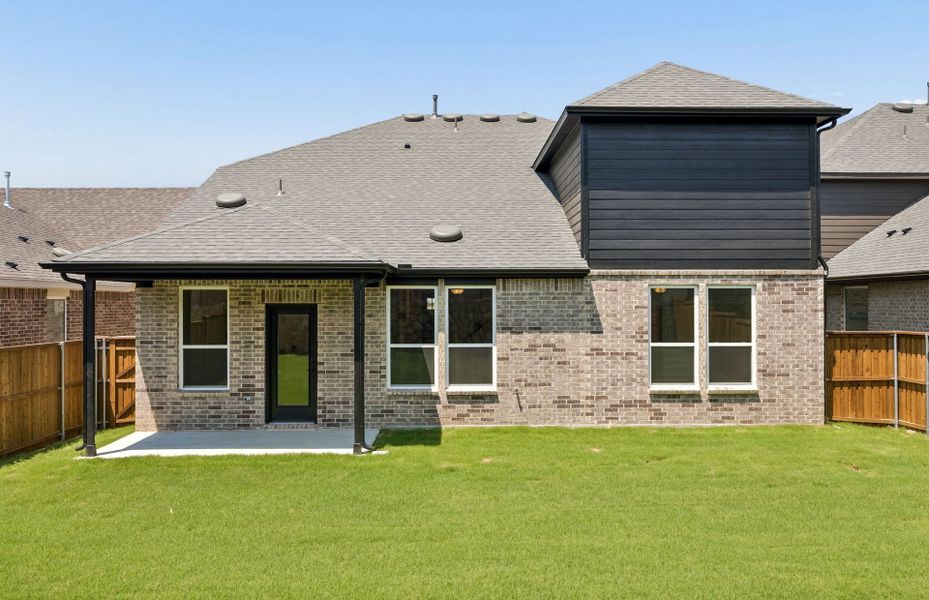 Exterior details and patio area of a home in Pinnacle at Legacy Hills, Celina (Image 18).