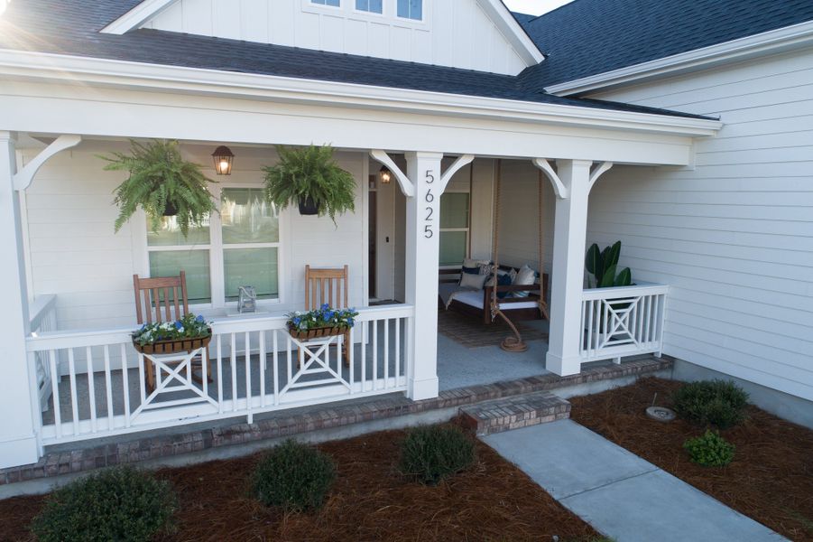 Representative exterior photo of a completed home built from the Ashton by Bill Clark Homes in Osprey Landing, Southport, NC (Image 29). Representative exterior photo of a completed home built from the Ashton by Bill Clark Homes in Osprey Landing, Southport, NC (Image 29).