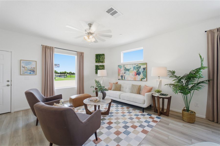 Representative furnished interior of a home built from the Kahn by CastleRock Communities in Municipal Drive Townhomes, Leander (Image 6).