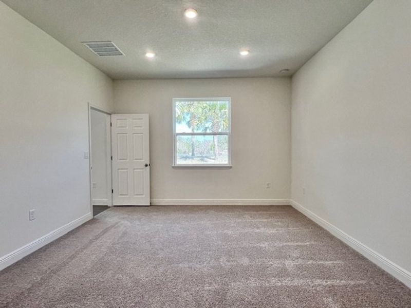 Spacious, unfurnished interior of a new home in Lakes At St Sebastian, Micco (Image 28).