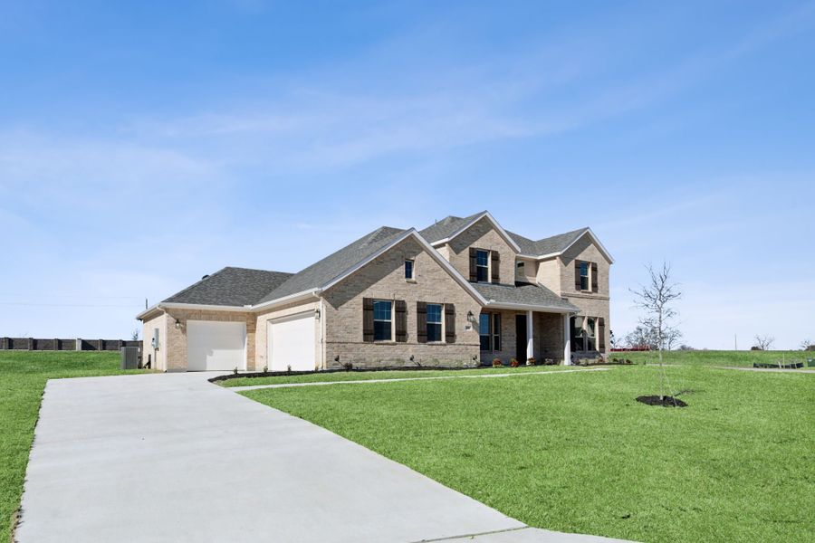 Representative exterior photo of a completed home built from the Emerson by Centre Living Homes in Lakeway Estates, Waxahachie, TX (Image 28).