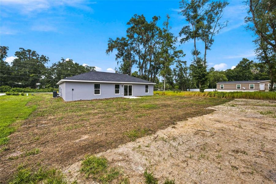 Exterior details and patio area of a home in , Ocala (Image 3).