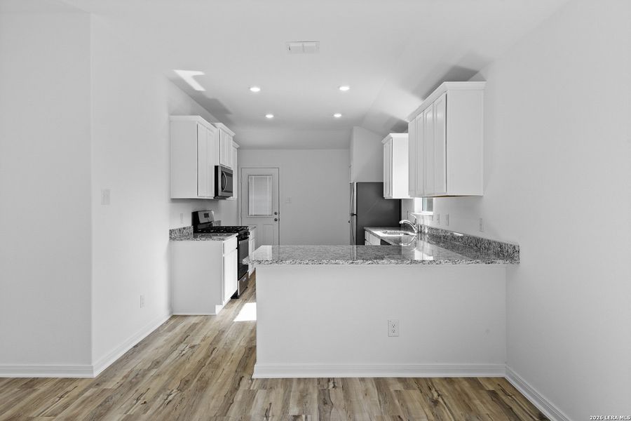 Furnished interior view inside a new home in Preserve at Medina, Von Ormy (Image 7).