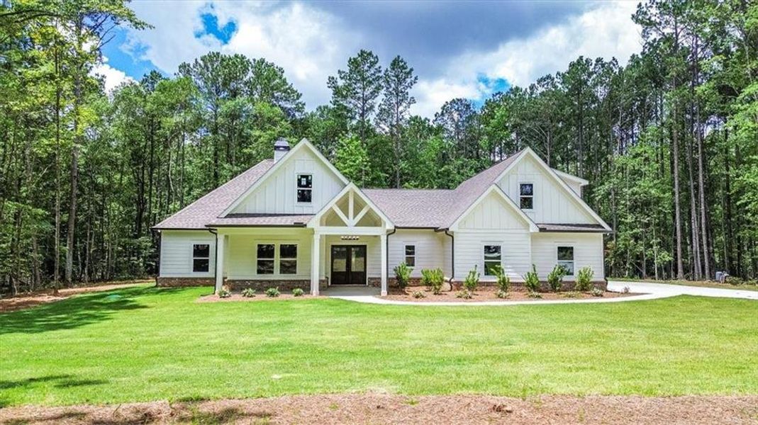 Front exterior of a new home in , Social Circle, GA, highlighting curb appeal (Image 23). Front exterior of a new home in , Social Circle, GA, highlighting curb appeal (Image 23).