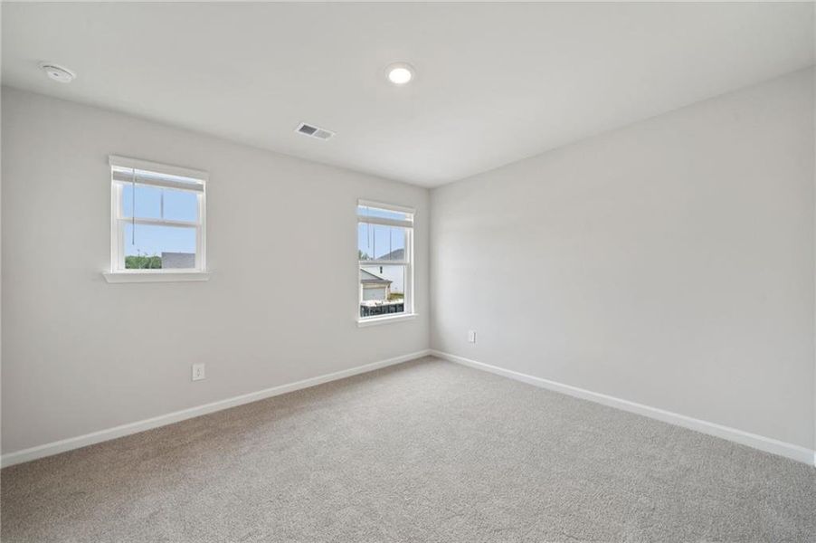 Spacious, unfurnished interior of a new home in Vines at Mill Creek - Estate Series, Braselton (Image 34).